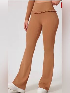 *FASH* Womens/Girls Cinnamon flare leggings with ruffled waist band .